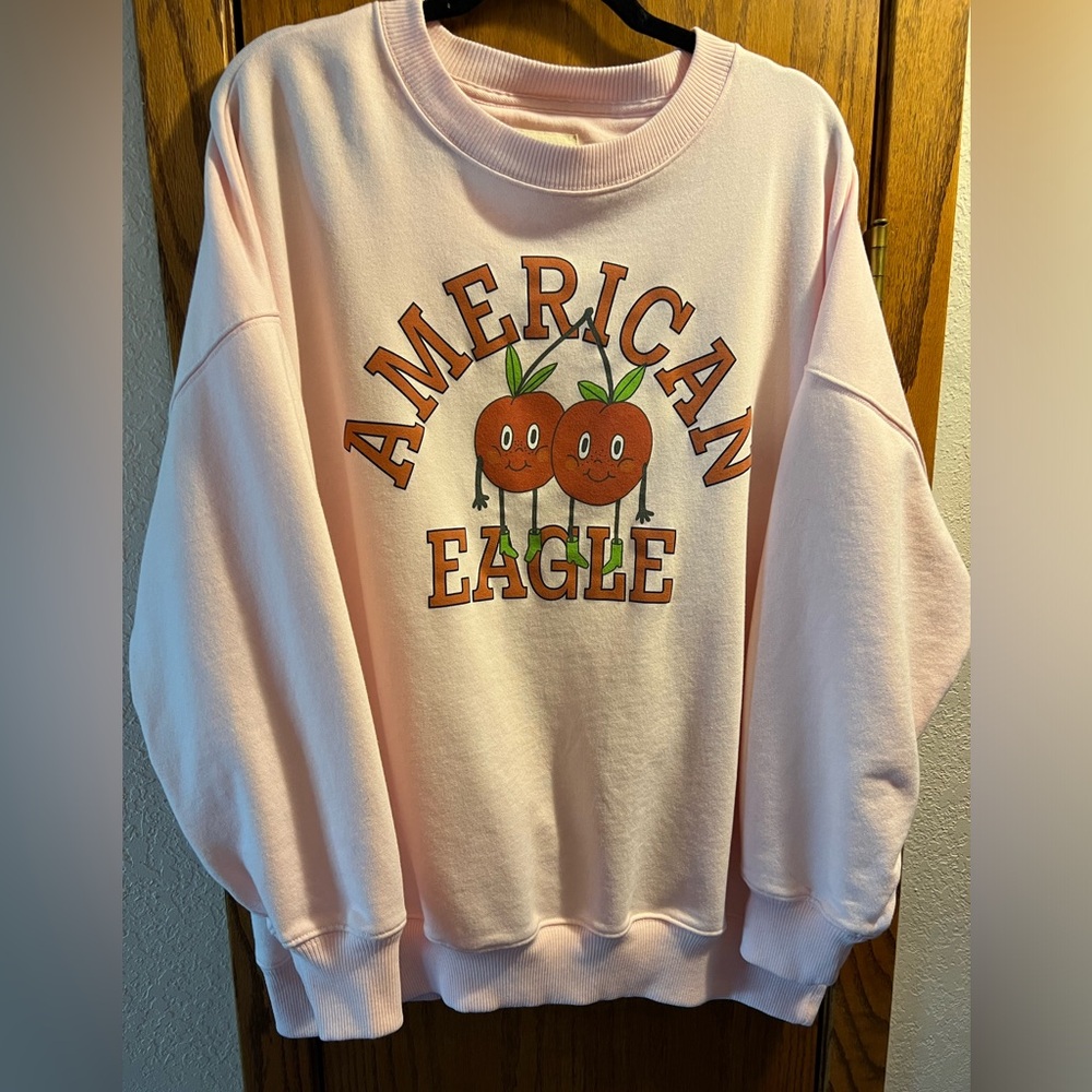 American Eagle oversized pink crew neck with cherries on front XL, soft & comfy!